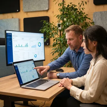 AI consultant reviewing business automation dashboard