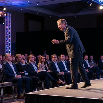 Executive audience listening to a leadership keynote