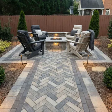Beautiful professionally constructed hardscape patio with stone pavers and outdoor seating area