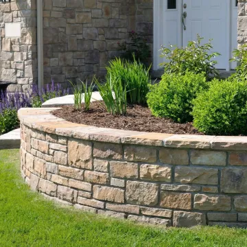 Completed stone masonry project showing detailed craftsmanship and premium materials