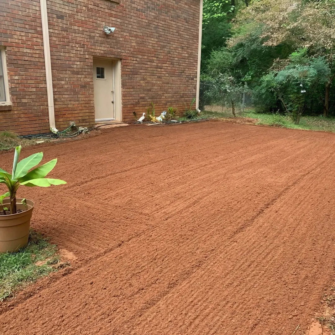 Yard grading process showing before and after transformation