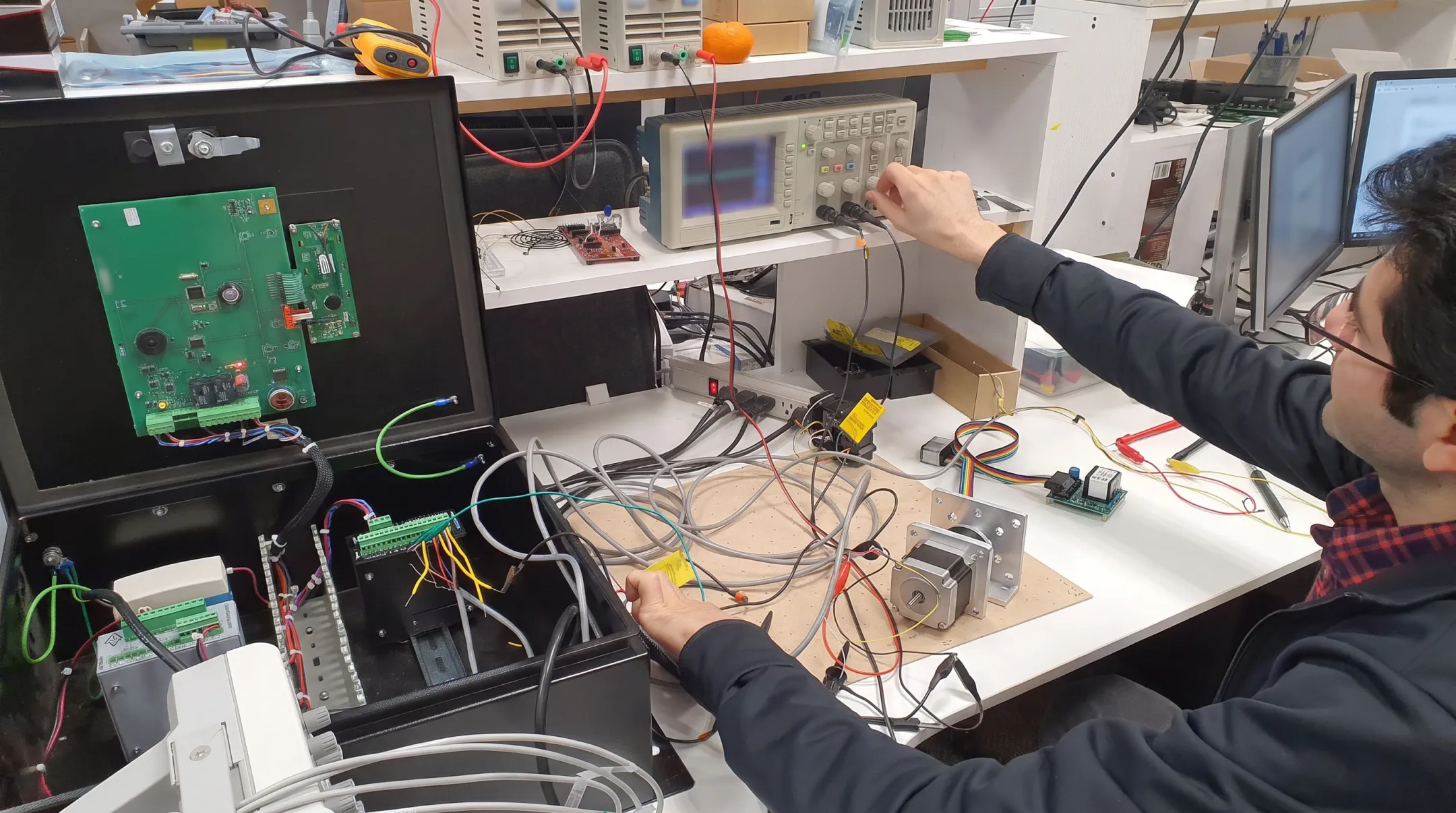 Electromechanical hardware prototype undergoing engineering validation in development laboratory