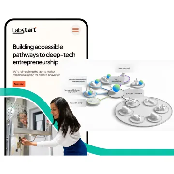 Designer working on cleantech website interface with sustainability metrics and renewable energy visualizations