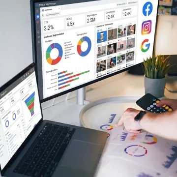 Team reviewing social ad performance metrics