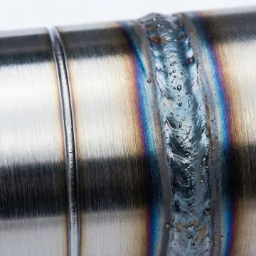 Comparison showing precision laser weld versus conventional weld on industrial component