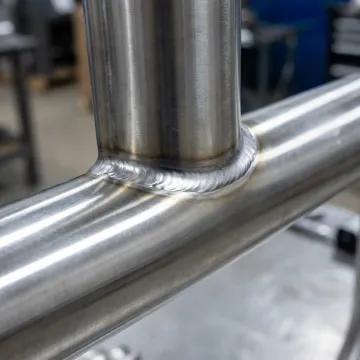 High-strength stainless steel welded joint showing clean weld bead and corrosion-resistant finish