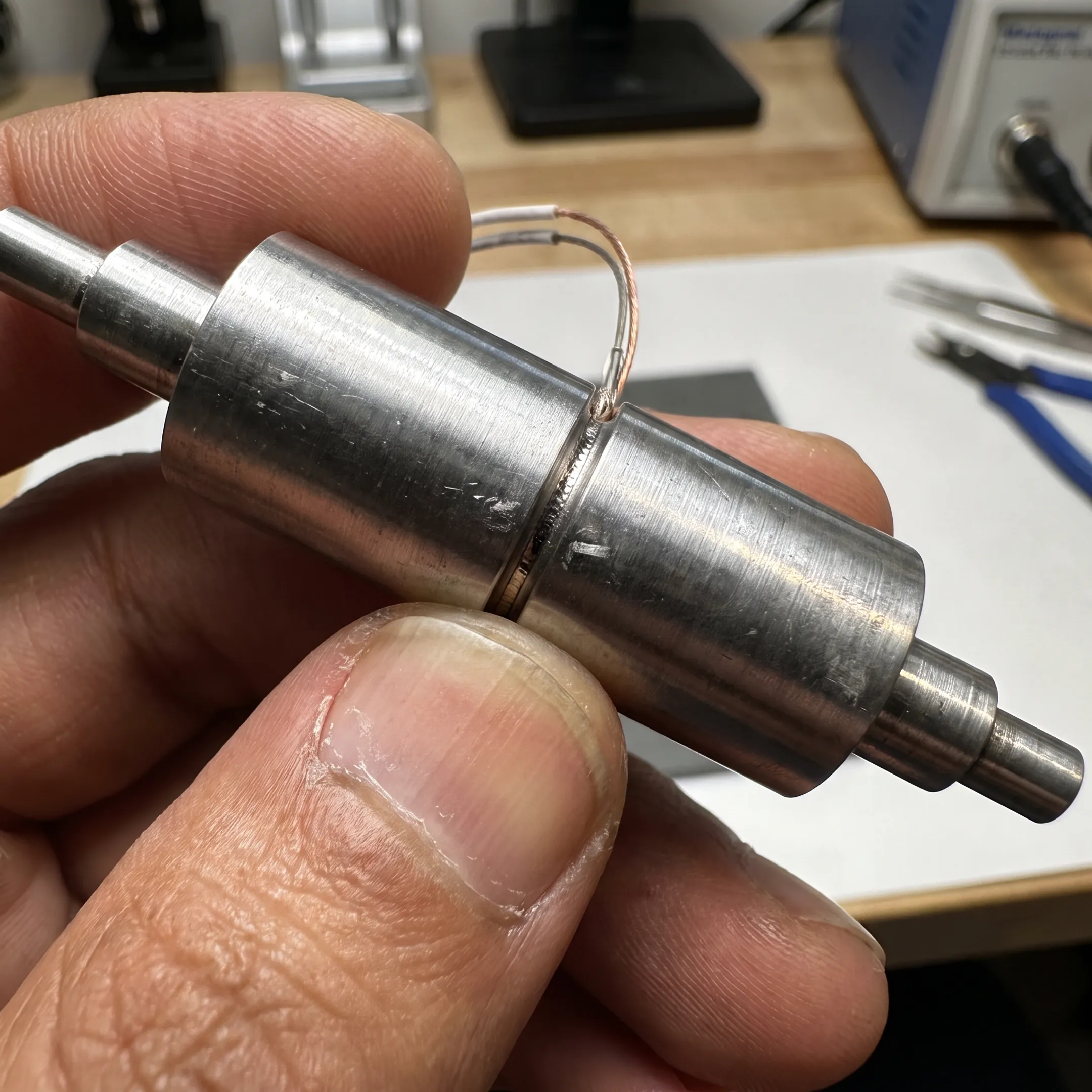 Close-up micro laser weld on an electronics housing
