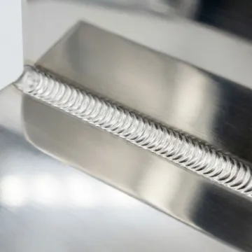 Close-up of perfect stainless steel weld bead showing precision and quality