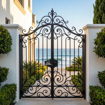 Custom wrought iron gate installation at coastal Dana Point residence