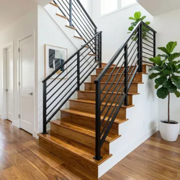 Elegant custom iron and wood railing installation