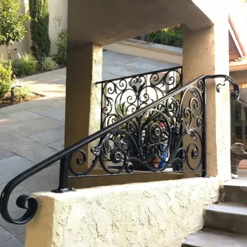 Custom wrought iron railings installed on residential staircase