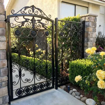 Elegant wrought iron gate with intricate scrollwork design