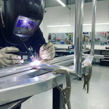 Custom aluminium fabrication workshop with precision welding equipment