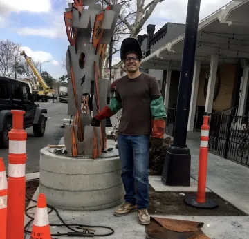 Commercial iron fence and gate installation at business property