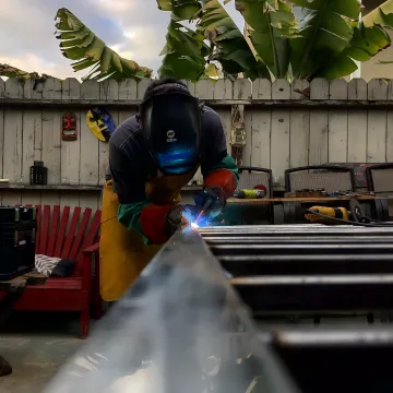 Elegant custom iron and wood railing installation