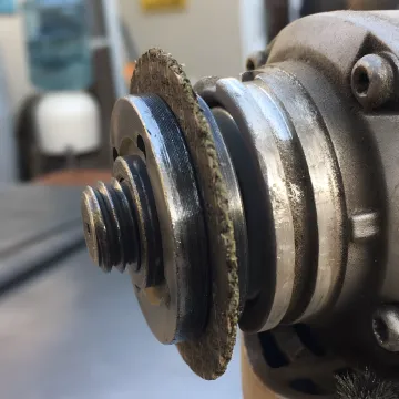 Skilled welder creating custom wrought iron artwork