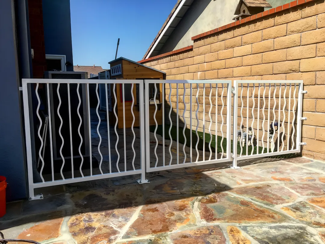 Commercial fence installation process showing fabrication and welding