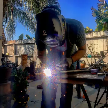 Professional technician repairing automatic gate system