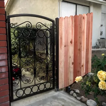 Custom vinyl fence gate with modern design in residential setting