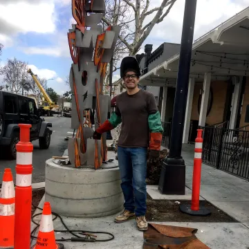 Elegant wrought iron railing with decorative scrollwork on residential staircase