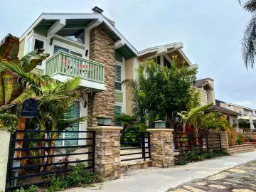 Various vinyl fence styles and colors displayed