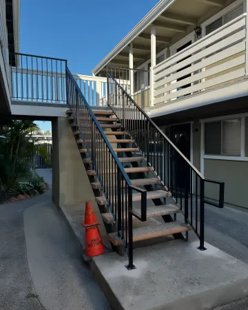 Professional vinyl fence installation in residential backyard