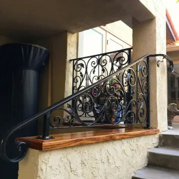 Custom wood and iron staircase with ornamental metal railings