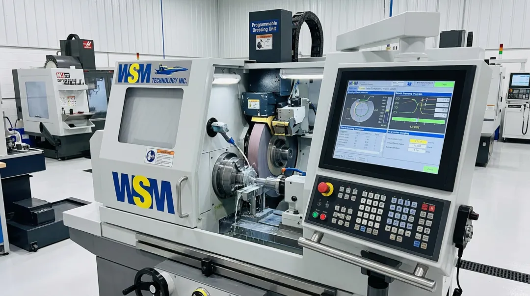 CNC centerless grinder with programmable dressing cycle and automated size compensation controls