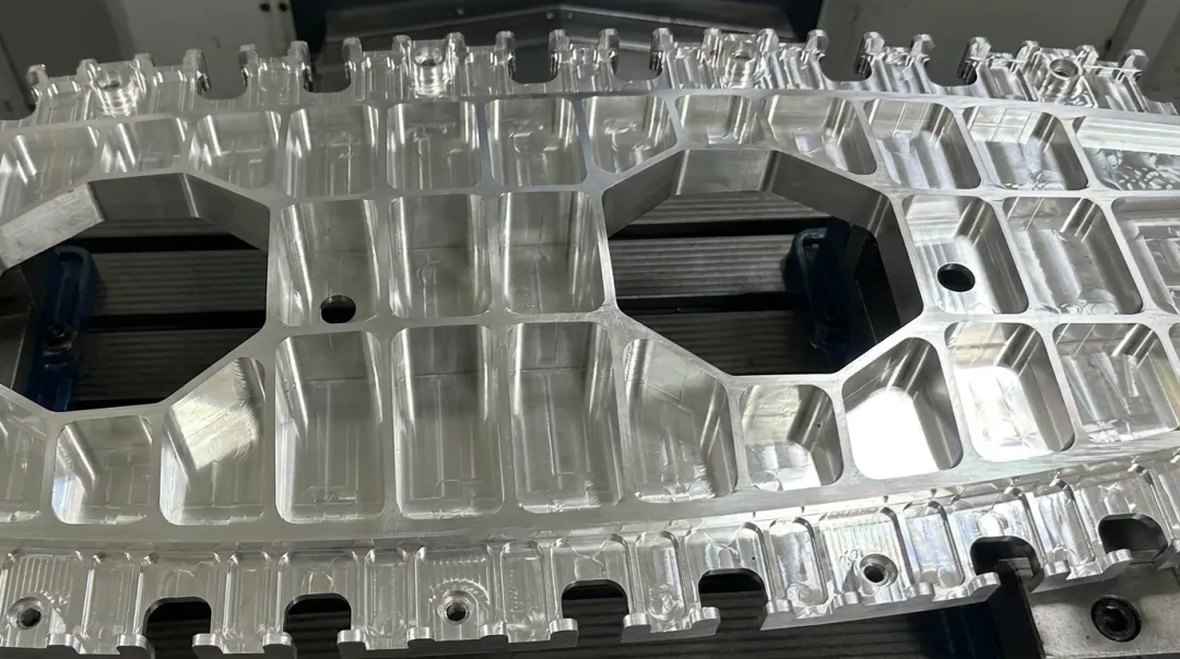 Aerospace aluminum structural component being precision milled on high speed machining center