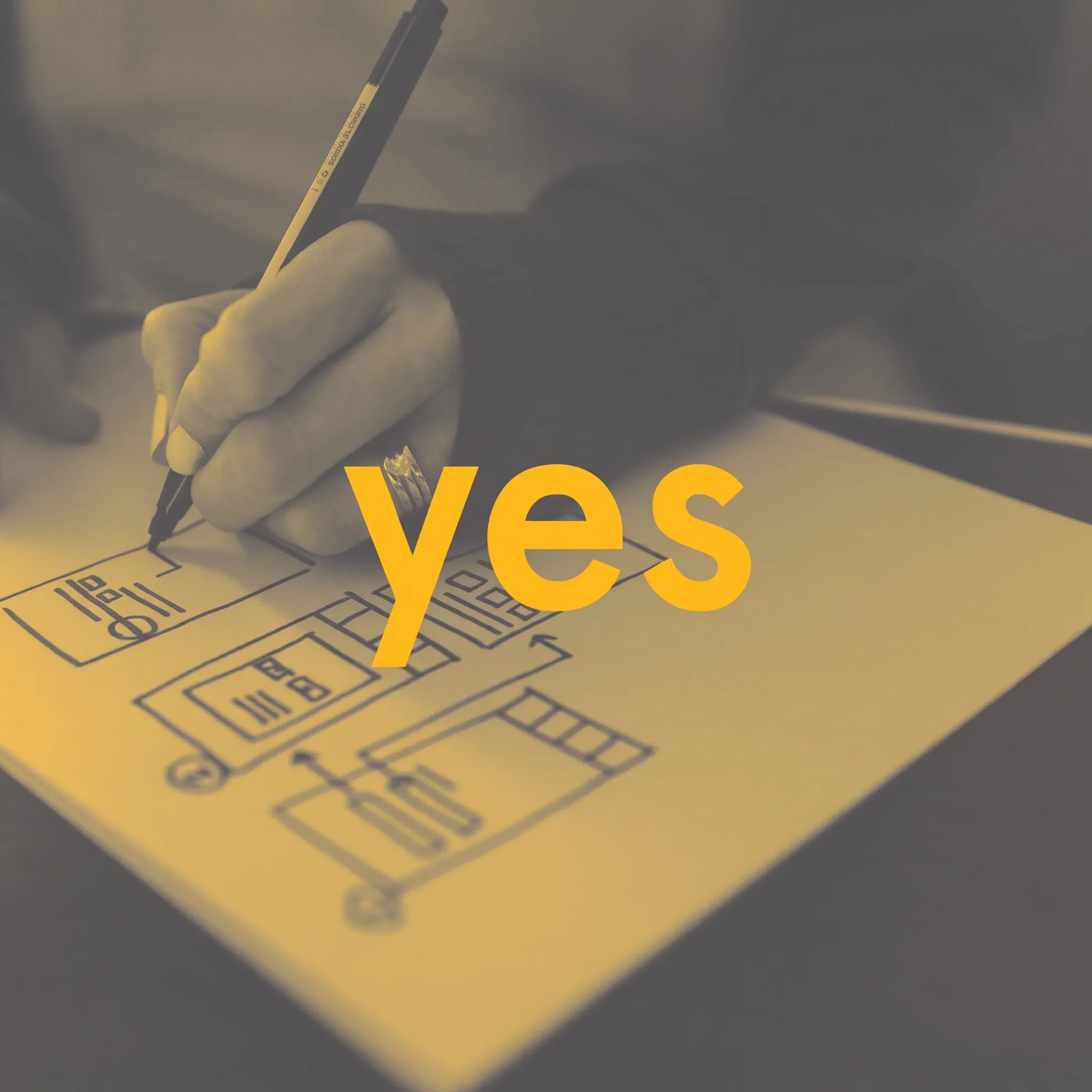 Designers collaborating over interface wireframes and user journey maps