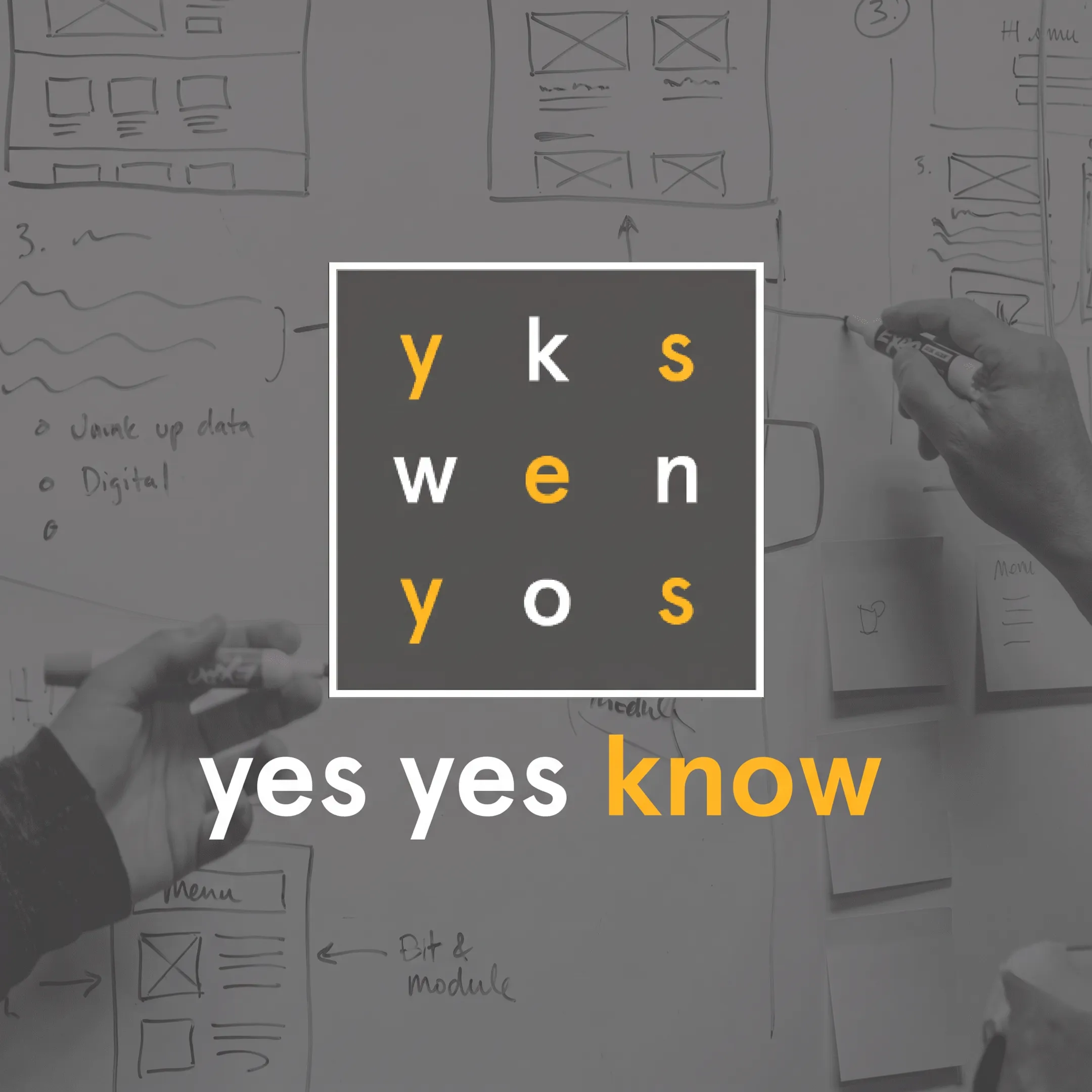 Startup team collaborating with designers and developers on a website project