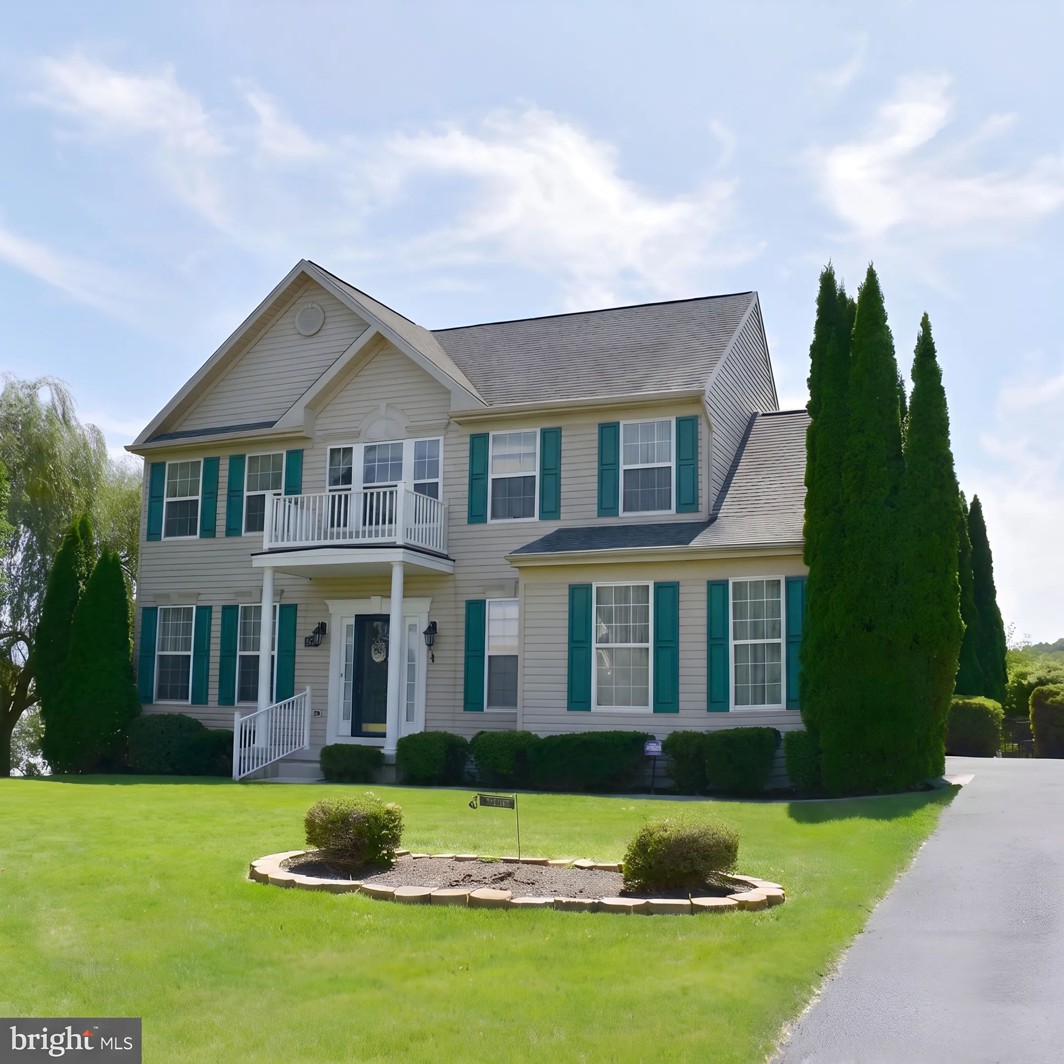 Luxury single family home exterior with landscaped grounds