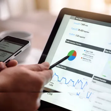 Digital marketing specialist analyzing dealership campaign performance