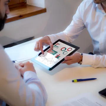 Marketer analyzing multi-channel campaign data