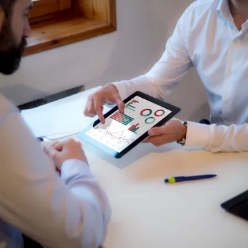 Team improving a business website on desktop screens
