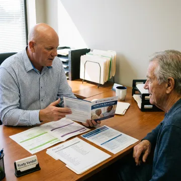 Licensed agent comparing Medicare plan options