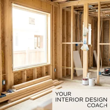 Interior design consultant reviewing remodel steps with a client at a construction site