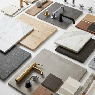 Designer comparing bathroom tile and fixture samples