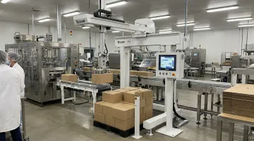 Yushin PA series compact robotic palletizer with E-touch Compact controller on production floor
