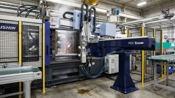 Yushin FRA series take-out robot performing high-speed precision part extraction