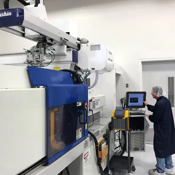 Take-out robot removing molded plastic parts