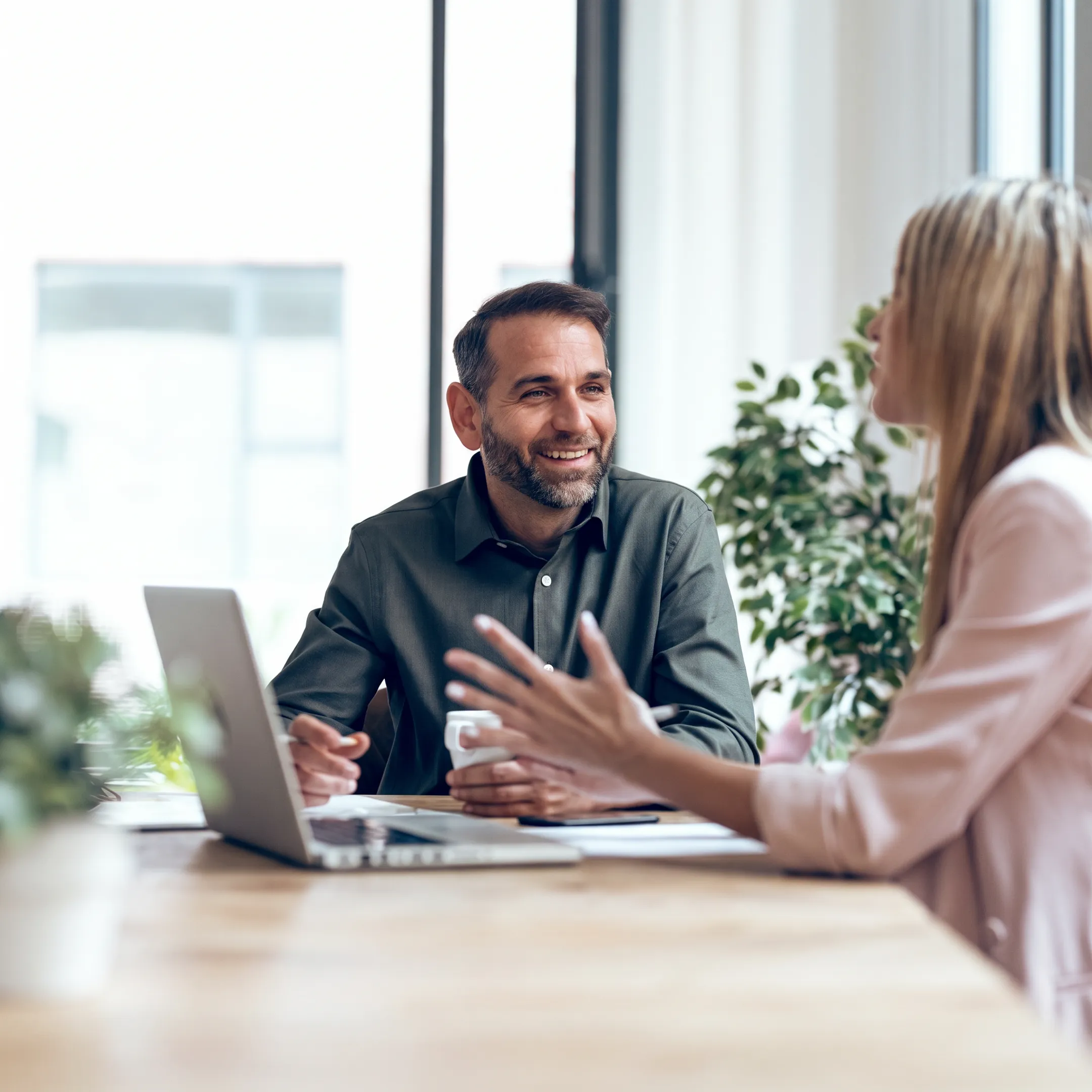 Tax professional presenting organized financial information during a secure online consultation