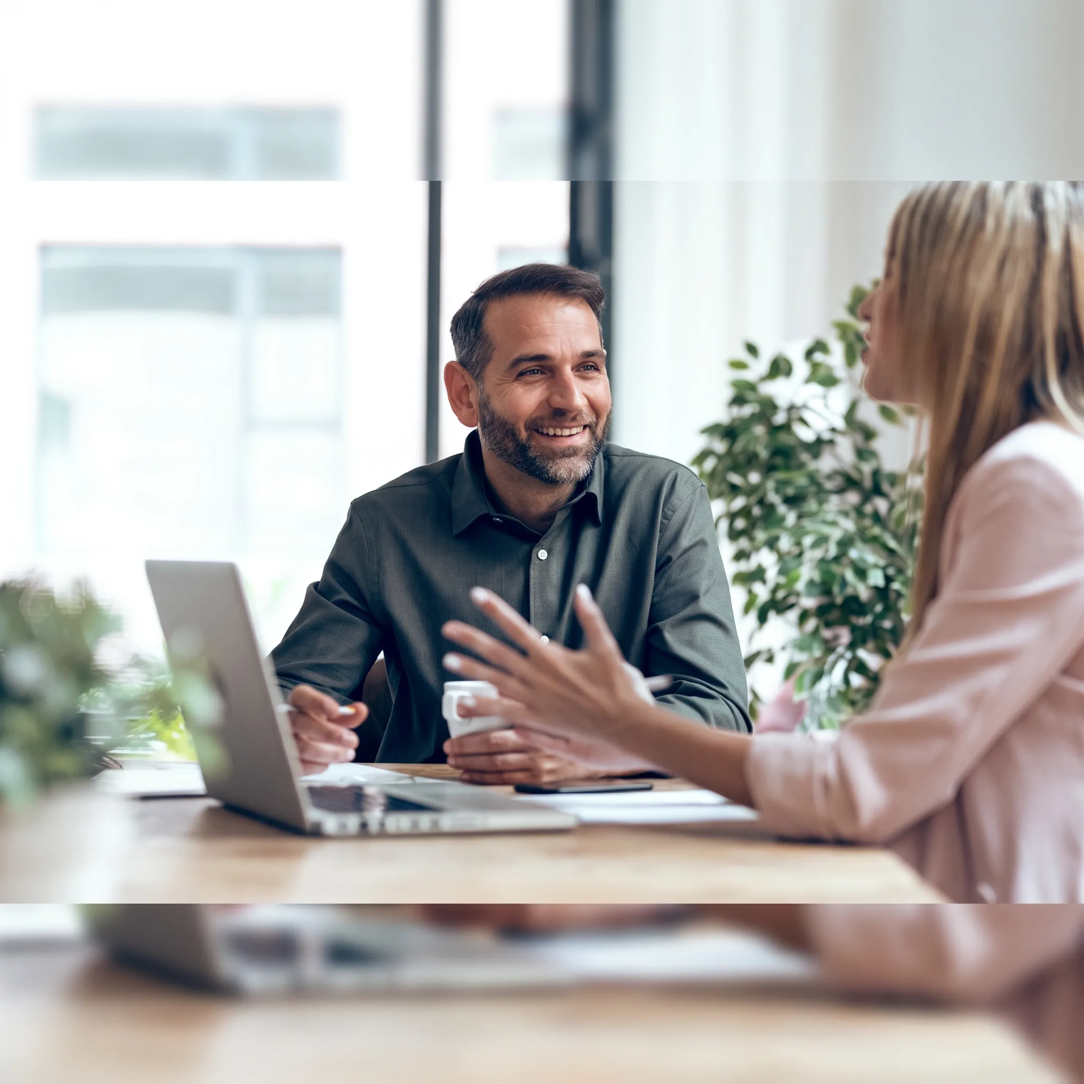 Financial advisor explaining sales and use tax information to a business owner