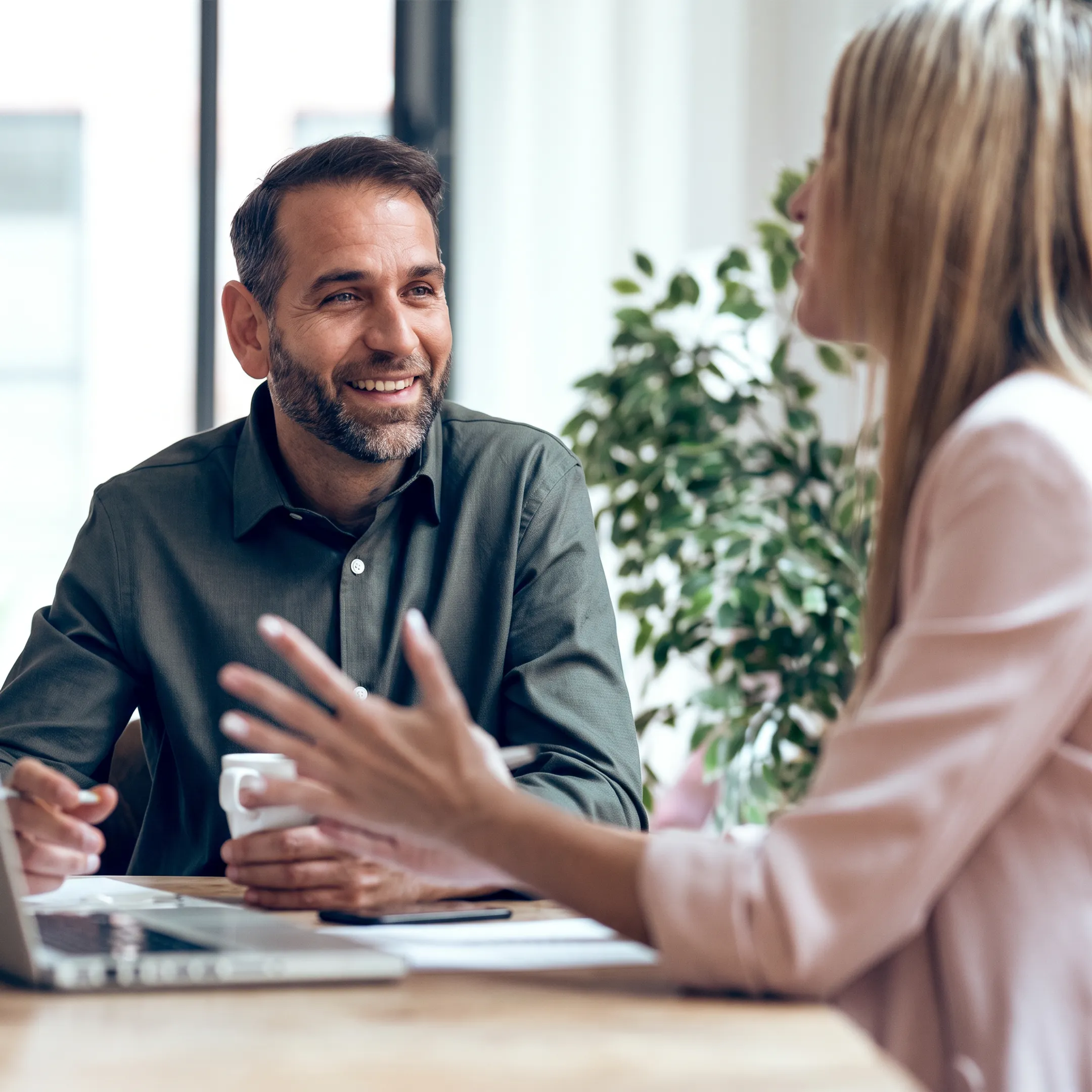 Tax professional explaining business tax planning to an Ohio business owner