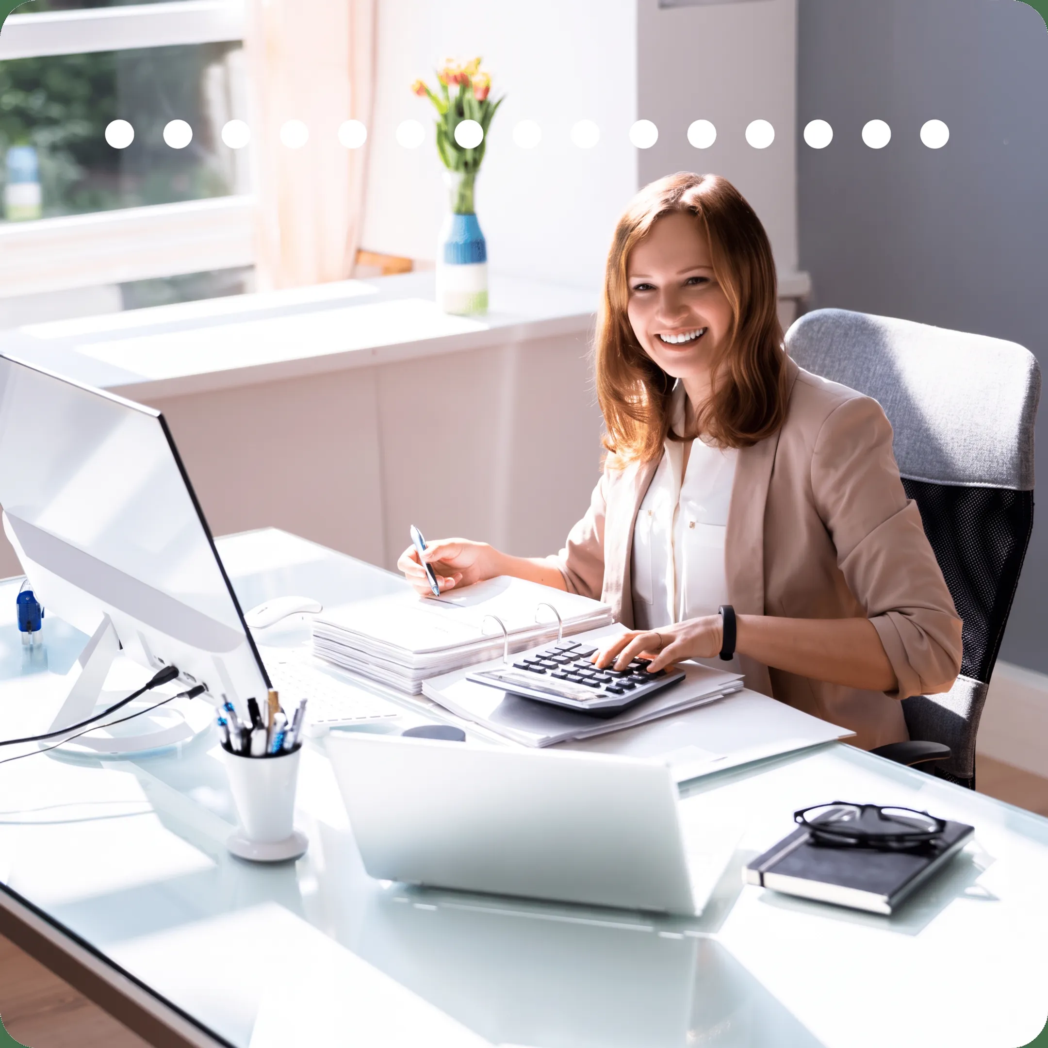 Professional reviewing reconciled QuickBooks reports and accounting records