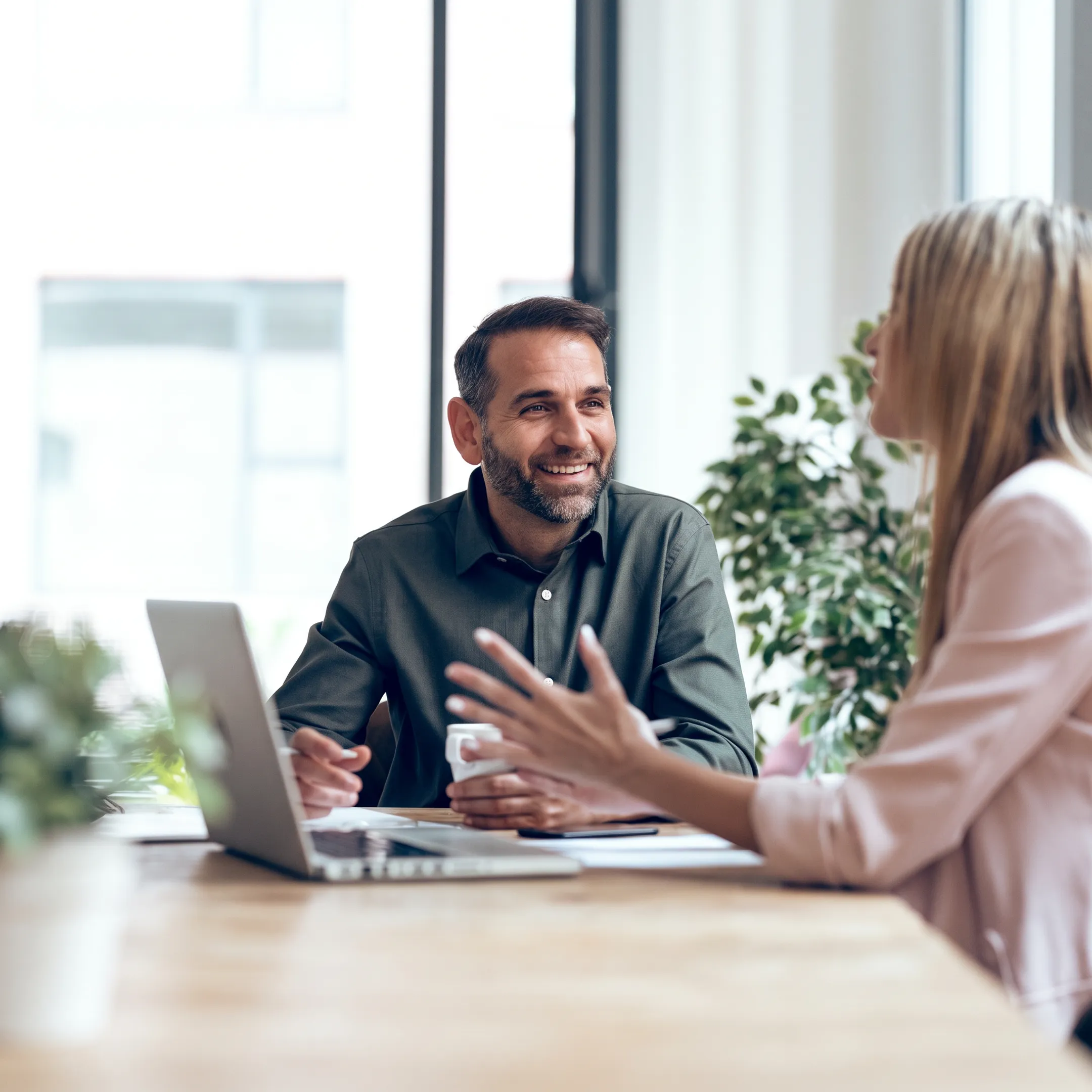 Business owner discussing financial performance with an accounting advisor