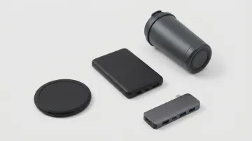 Branded corporate tech accessories including wireless charger power bank and insulated tumbler